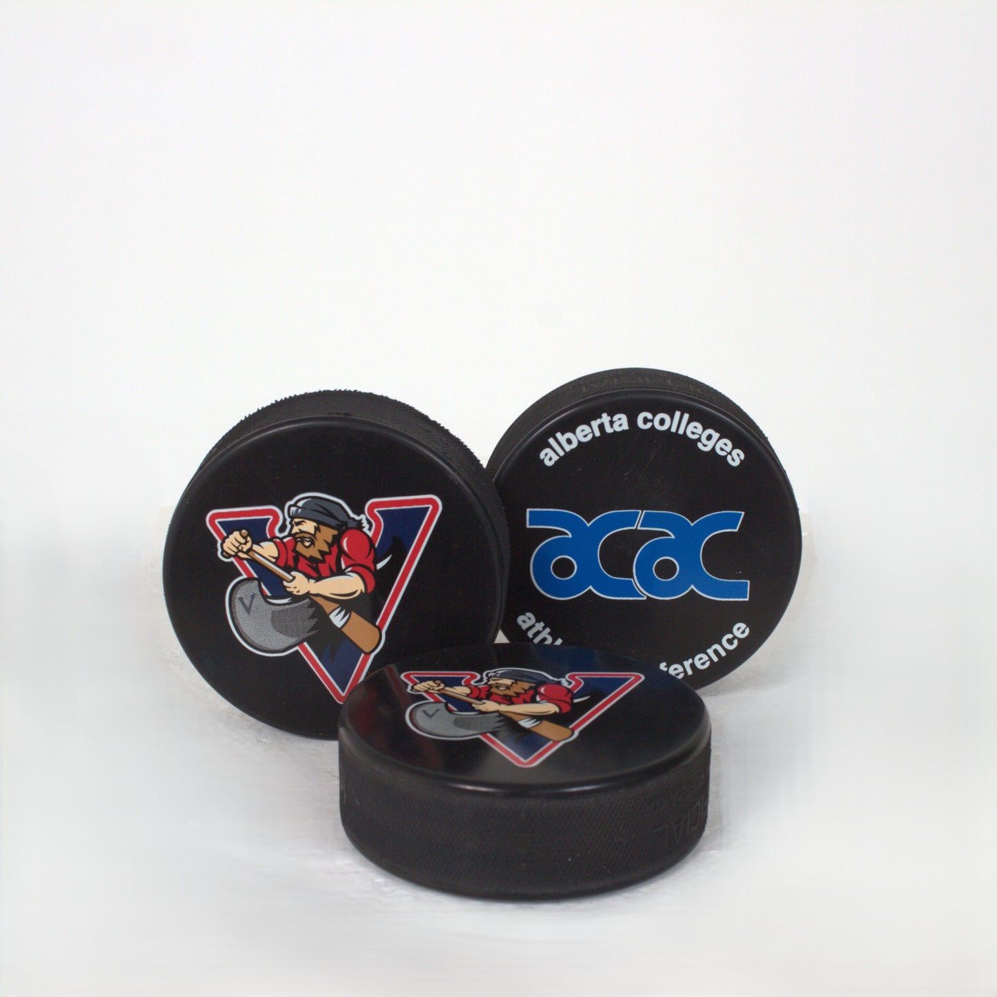 Portage College Voyageur Hockey Pucks
